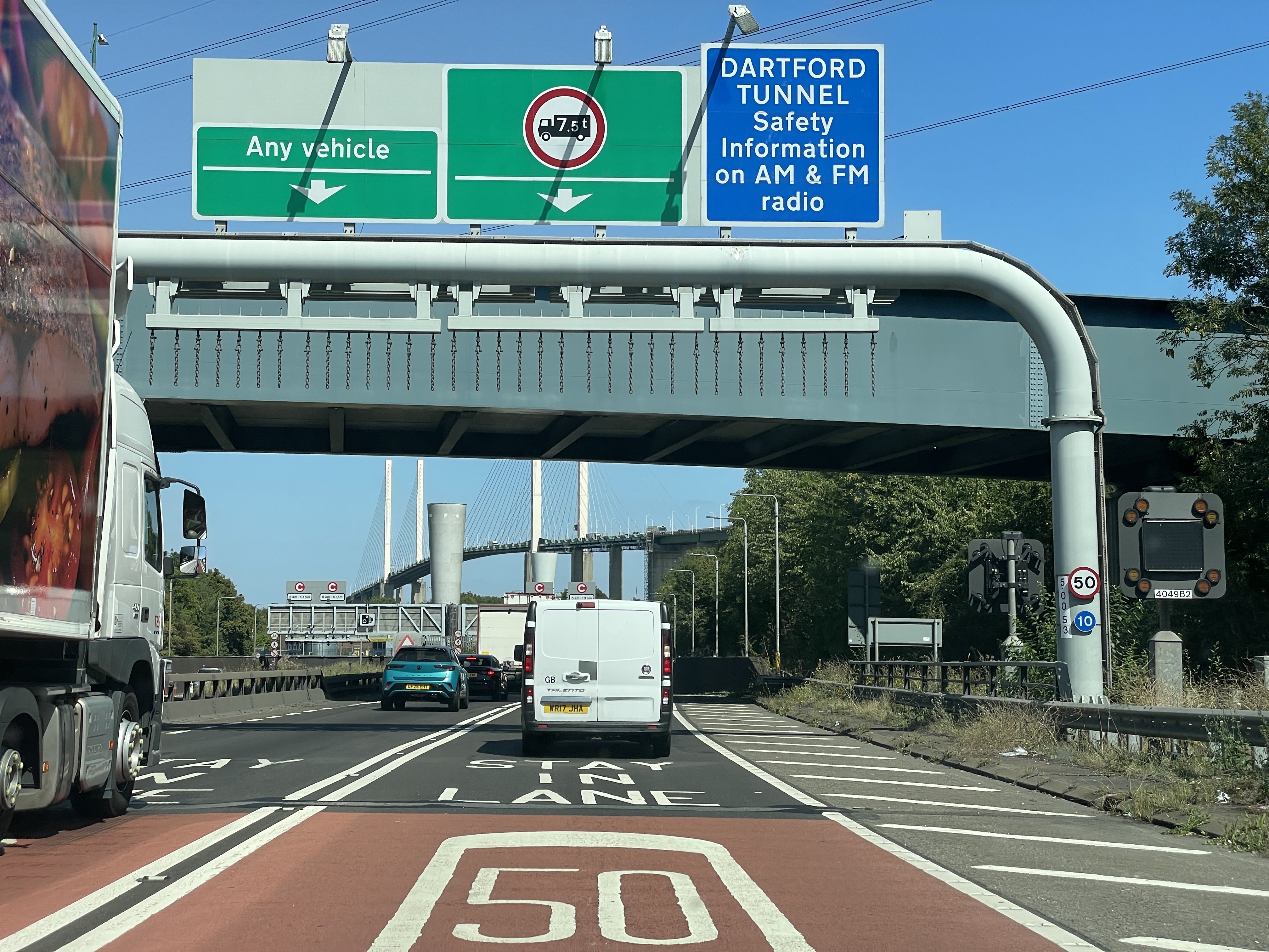 Dartford Crossing with AutoChain branding showing modern toll payment system and bridge infrastructure
